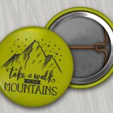 One Inch Round Custom Buttons- with a green background and a Take a walk to the mountains logo