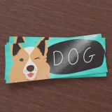 5x2 Inch Horizontal Rectangle Stickers This photo is a rectangle sticker of an illustrated dog winking with the text "dog"